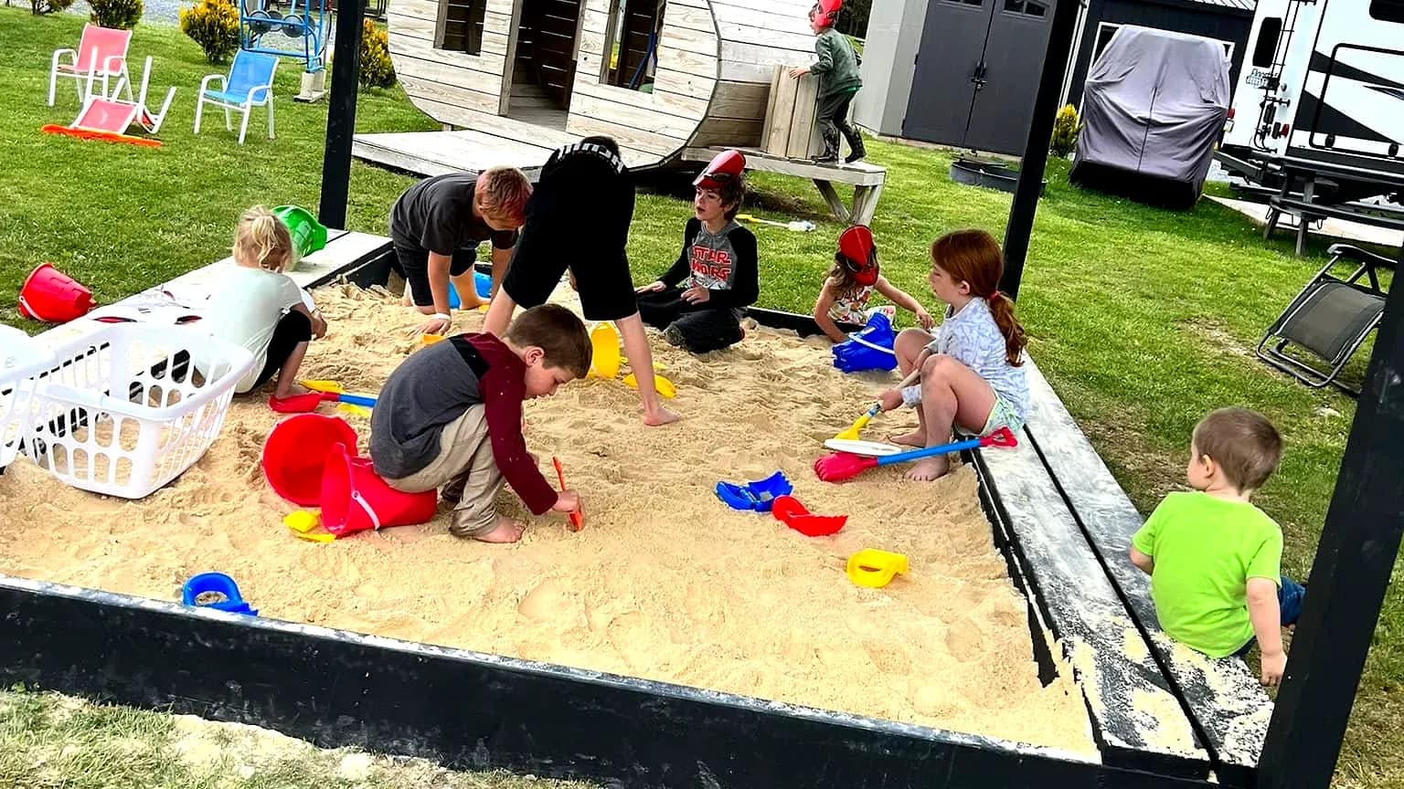 Kids in playground sandbox