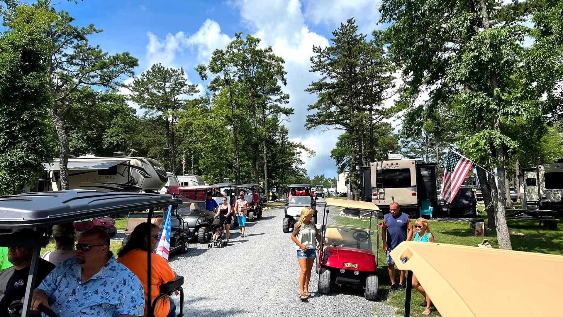Campground road with golf carts and campers