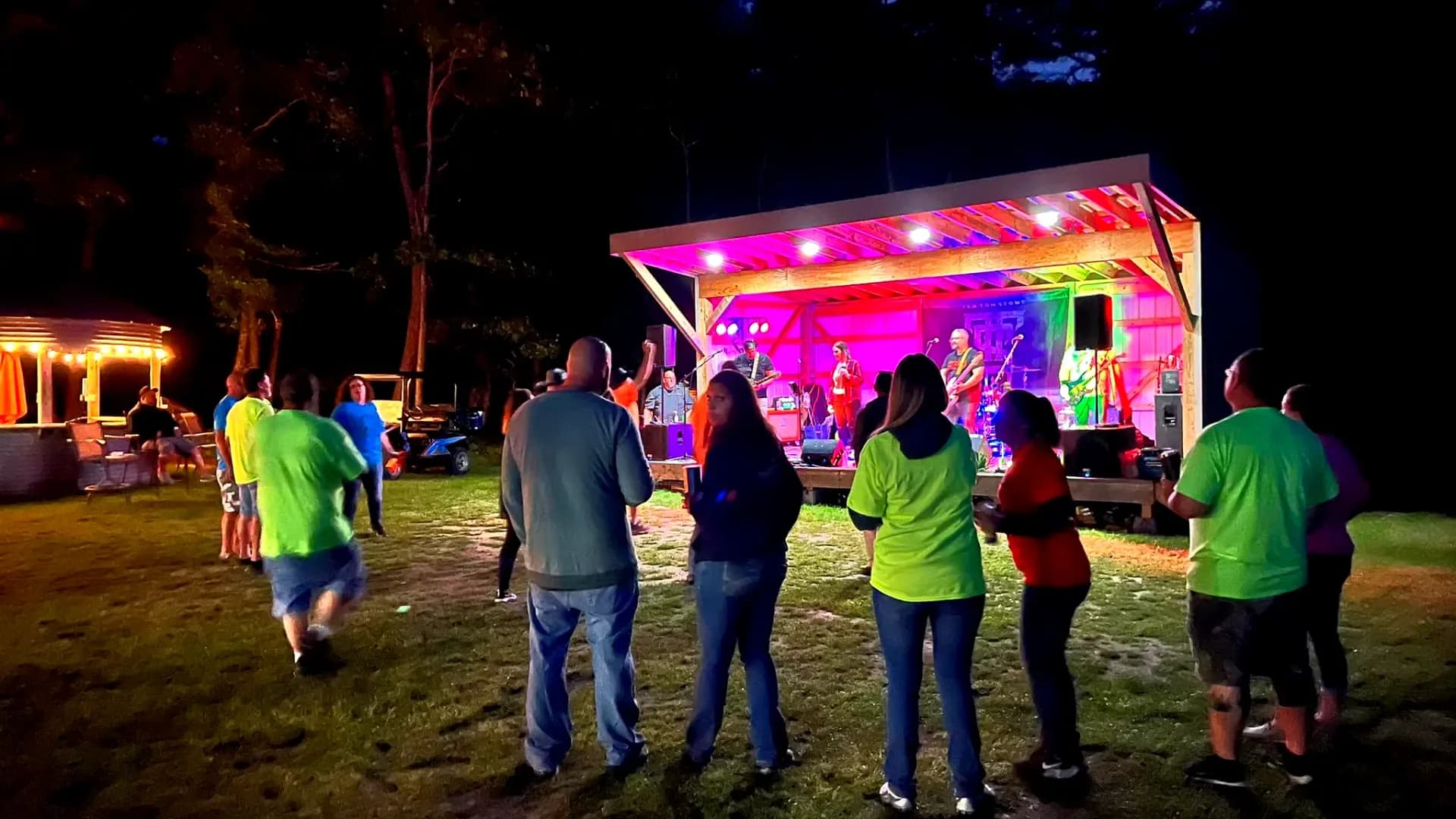 Group gathered around campfire