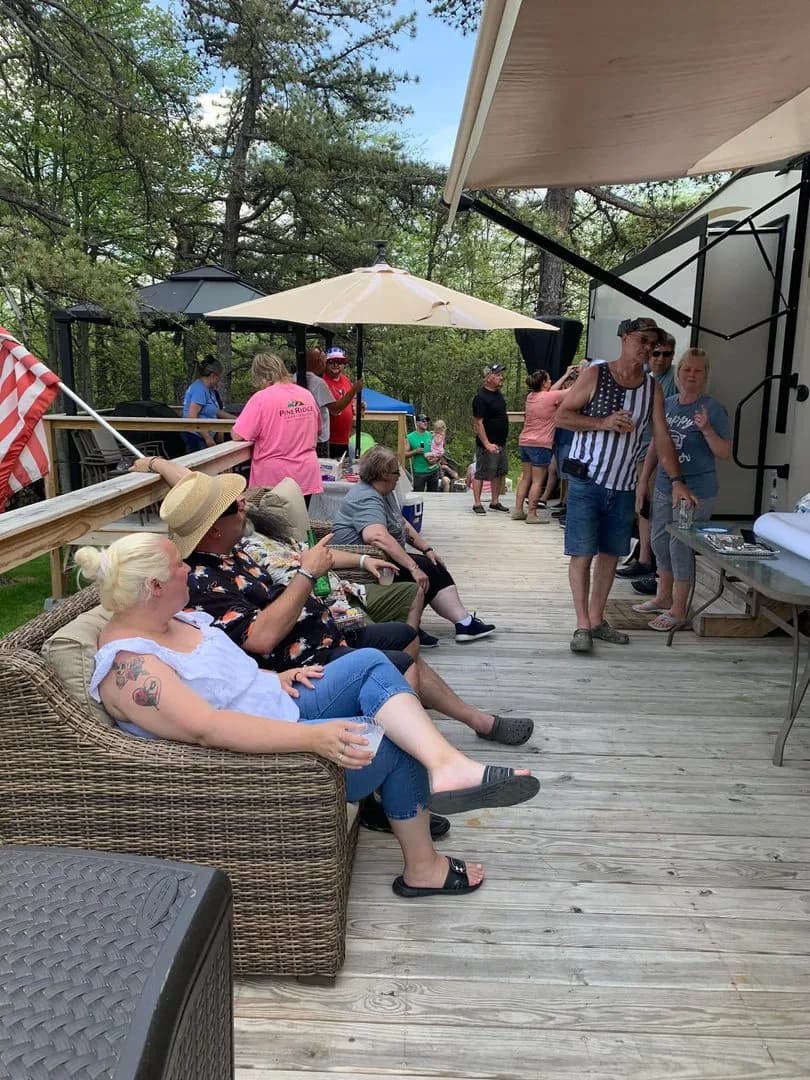 Happy families enjoying seasonal camping at Pine Ridge Campground