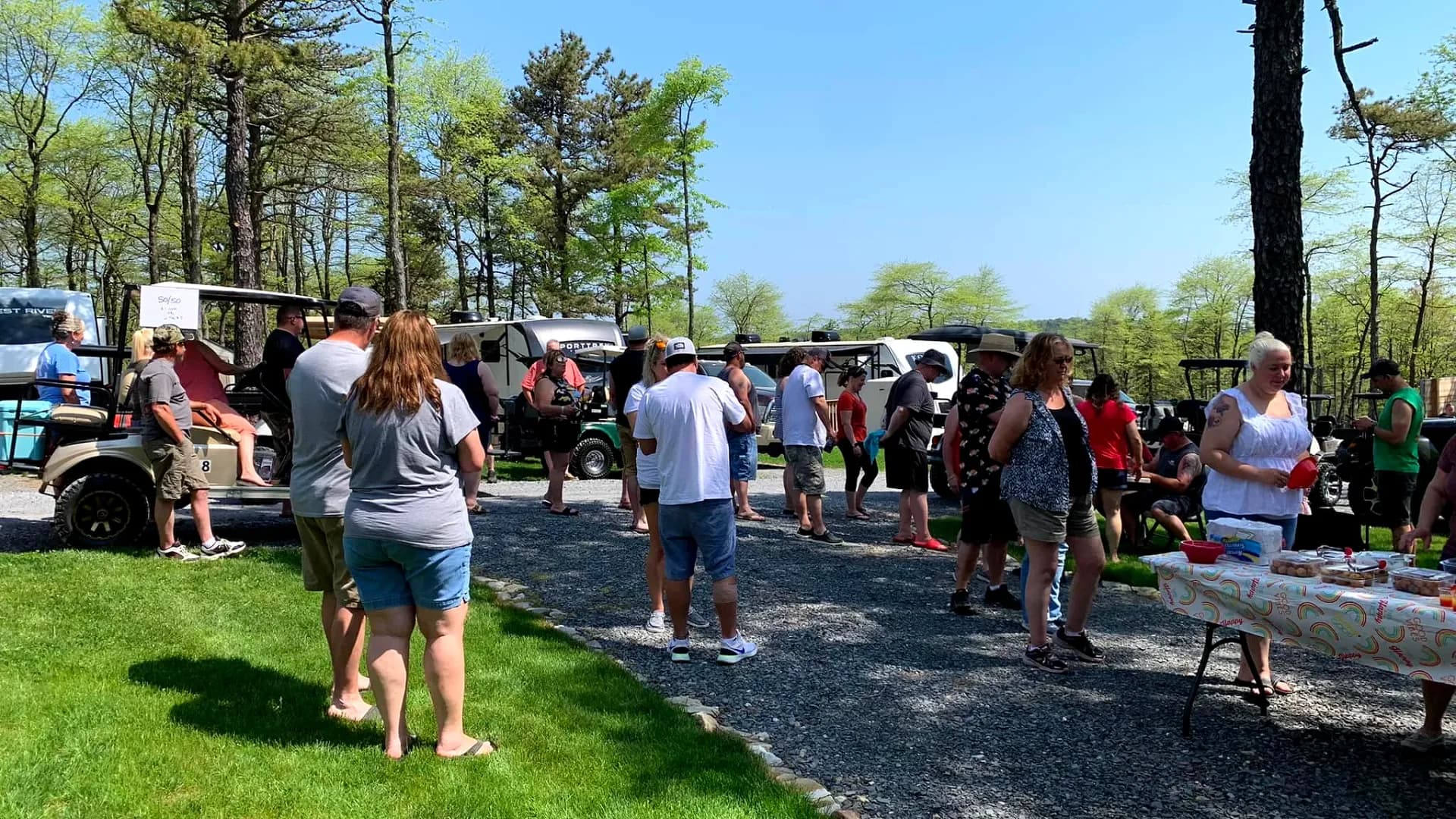Community gathering with golf carts