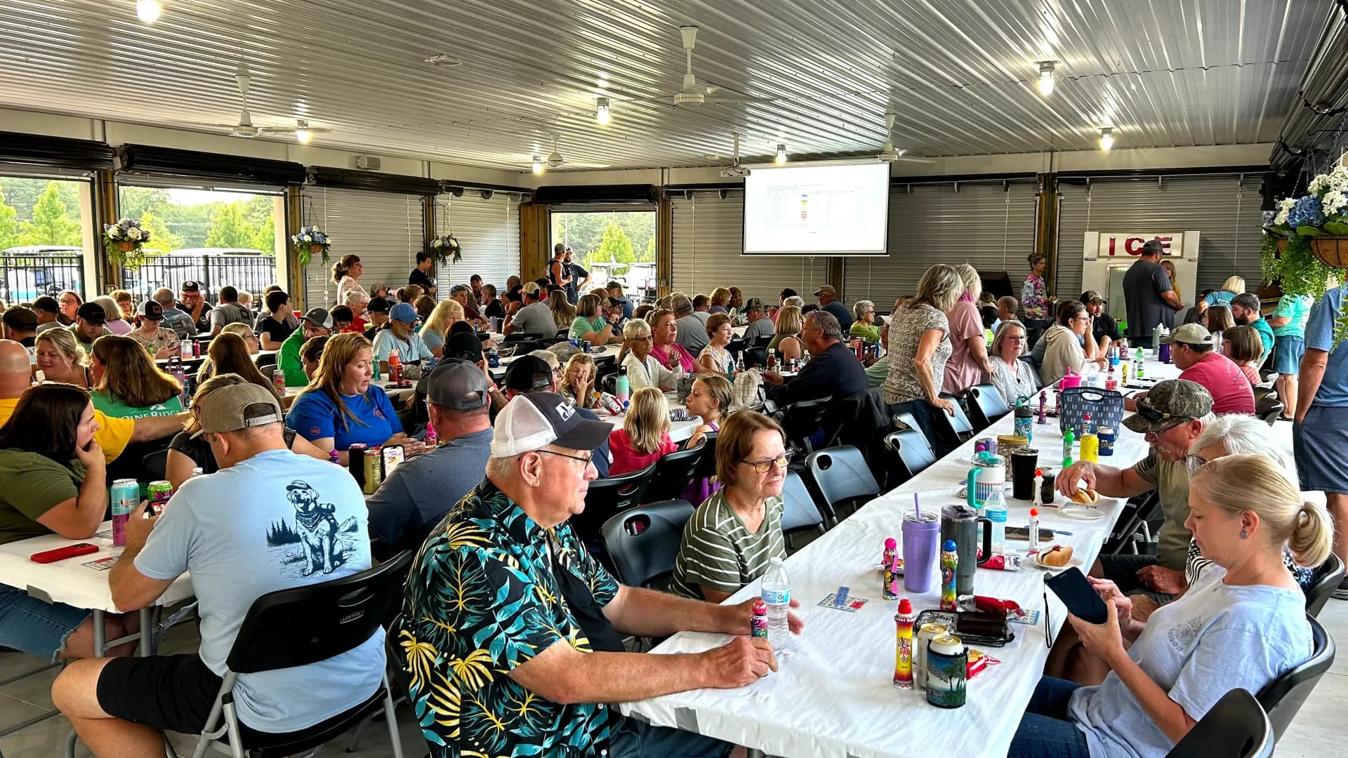 Packed pavilion during community dinner
