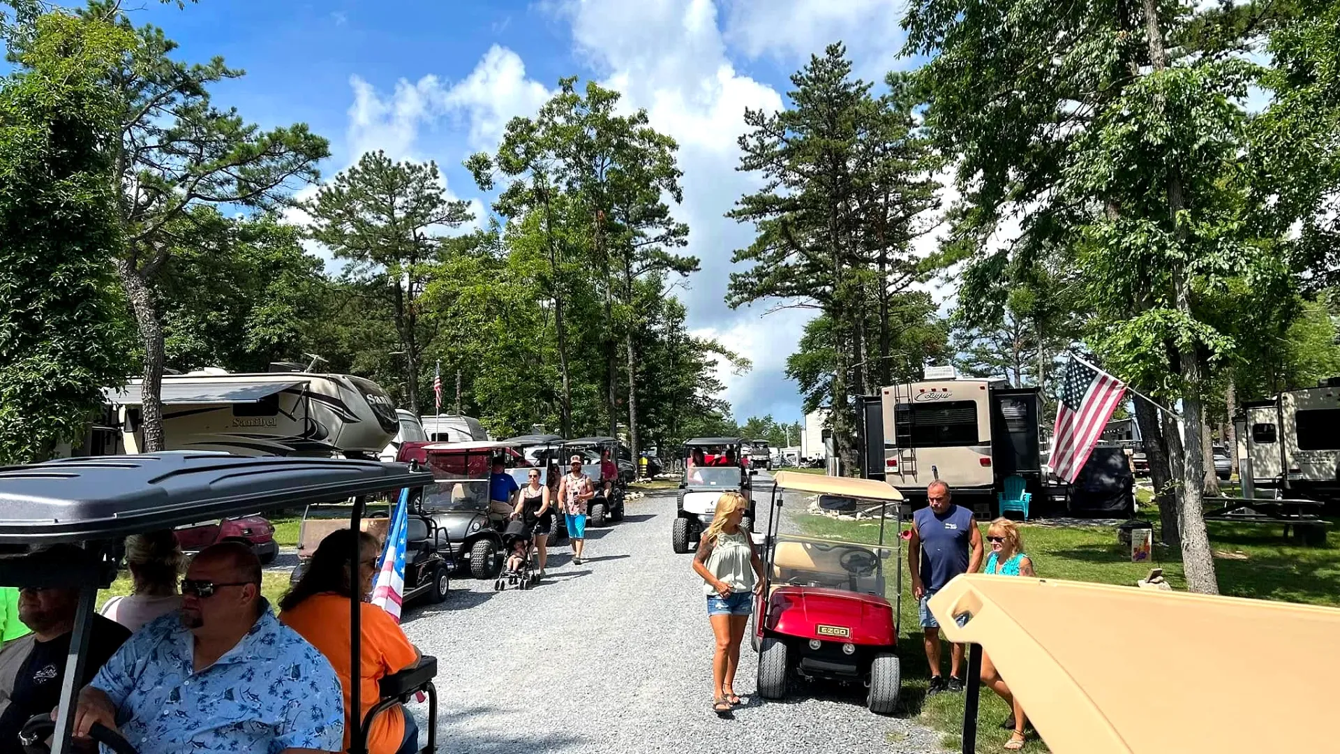 Campground road with golf carts and campers