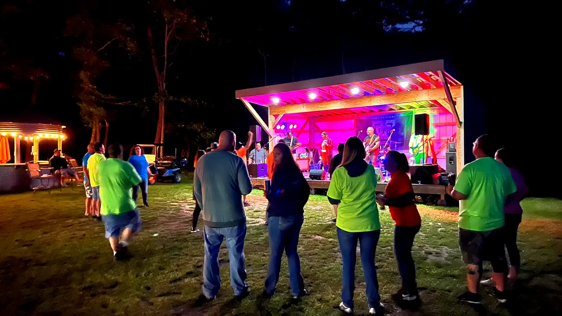 Group gathered around campfire