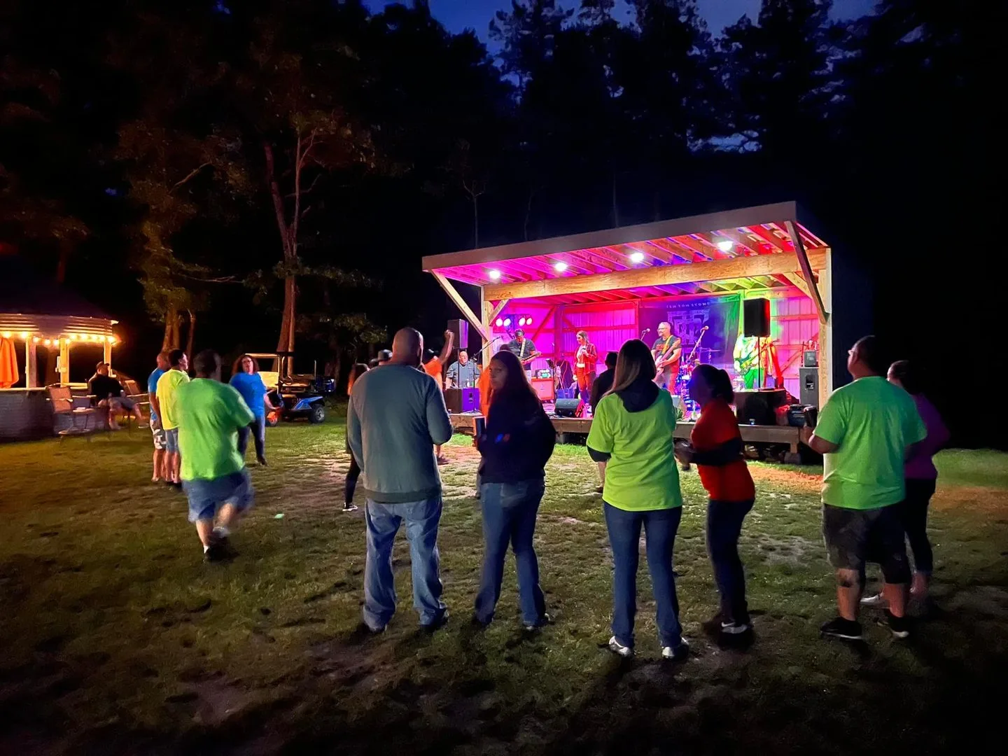 Pine Ridge Campground community gathering around campfire